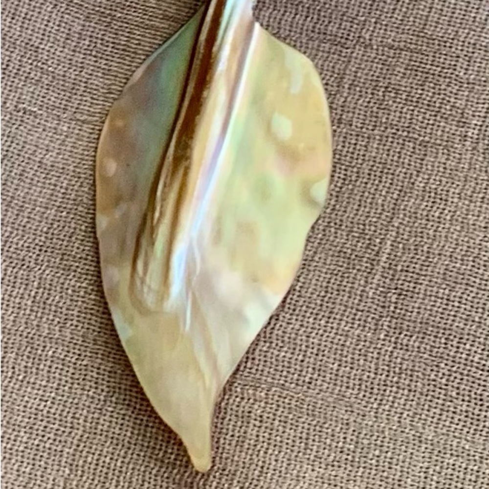 Beaded shell necklace with a leaf shaped shell pendant